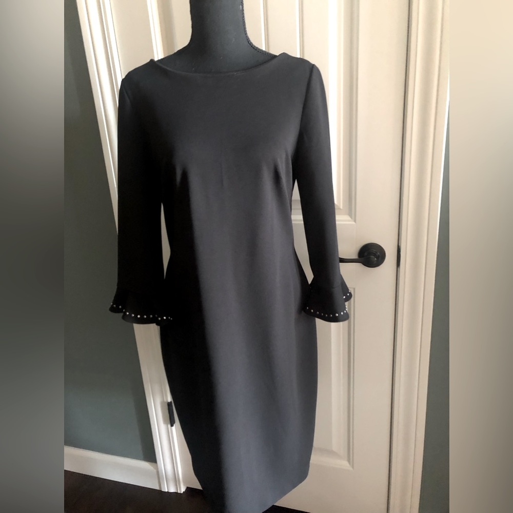 Calvin Klein Size 10 Knit Dress. Silver accent Flounce Sleeves.